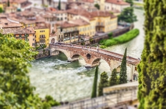 Ancient Roman Bridge in Verona, Italy. Tilt-shift effect applied