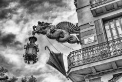Chinese dragon holding a lantern, La Rambla, Barcelona, Catalonia, Spain