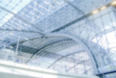 Defocused background with interiors of Berlin Main Train Station. Intentionally blurred post production