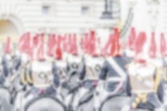 Defocused Background with british guards on parade in London. Intentionally blurred post production