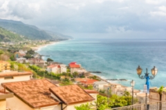 Defocused background with aerial view of coastline in Calabria, Italy