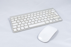 White wireless computer keyboard and mouse