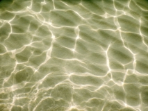 A white sand bottom in Salento beautiful sandy beach, Italy