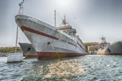 Black Sea Fleet warships in quay of Sevastopol bay, Crimea