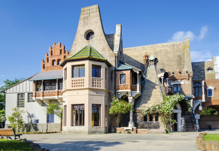 Colorful building in Villa Torlonia, famous public park in Rome, Italy