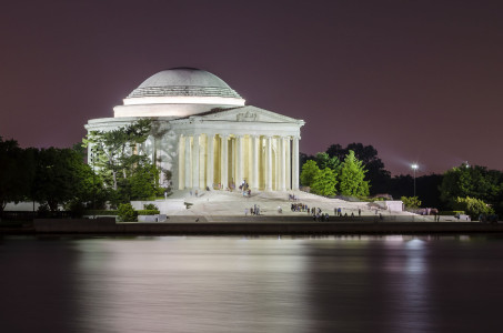 The iconic Jefferson Memorial reflecting in the Tidal Basin at night, Washington DC, USA