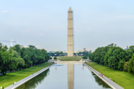 The iconic Washington Monument mirroring in the Reflecting Pool, Washington DC, USA