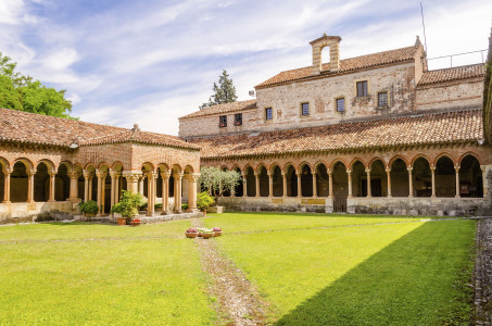 Cloister of San Zeno Cathedral showing ornate arches and carvings, Verona, Italy