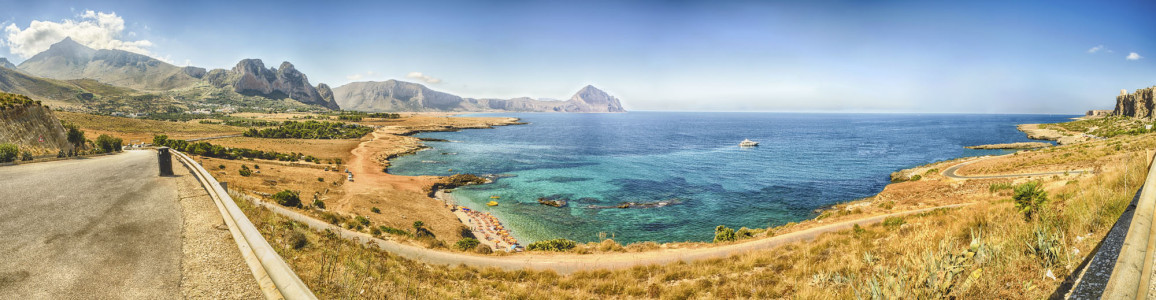 Panoramic aerial view over sicilian coastline and Cofano Mountain, San Vito Lo Capo, Italy