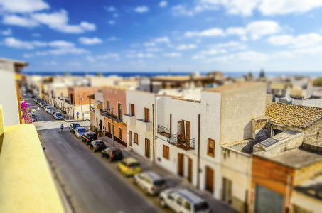 Aerial view over the town of San Vito Lo Capo, Sicily, Italy. Tilt-shift effect applied
