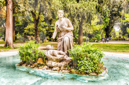 Scenic classical fountain in the iconic Villa Borghese park, Rome, Italy