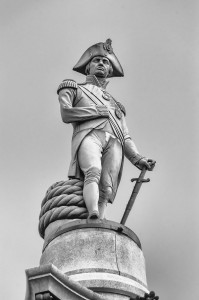 Nelson statue atop column at Trafalgar Square, iconic landmark in London, UK