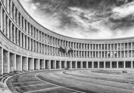 Scenic neoclassical architecture on the public road in the EUR district, Rome, Italy