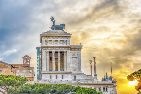 The iconic Altar of the Fatherland, scenic profile at sunset in Rome, Italy