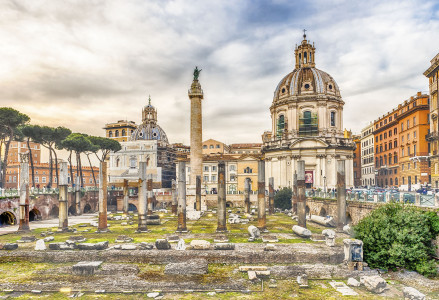 Scenic ruins of the Trajan's Forum and Column in Via dei Fori Imperiali, Rome, Italy