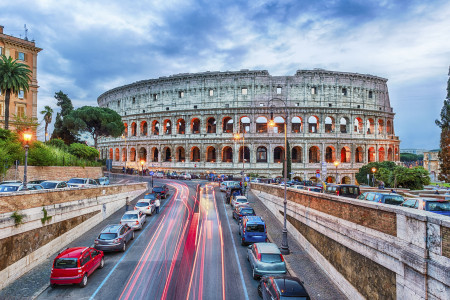 Aerial view over the Flavian Amphitheatre, aka Colosseum in Rome, Italy. Long exposure at dusk