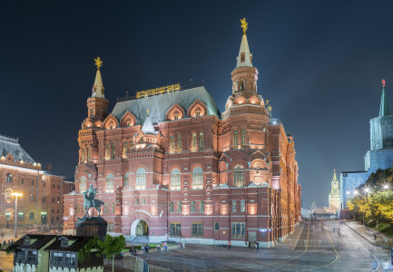 The State Historical Museum and Marshal Zhukov statue at night, Moscow, Russia