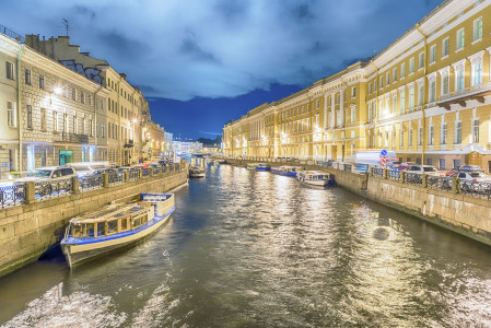 Scenic night view over Moyka River embankment, iconic citysights in St. Petersburg, Russia