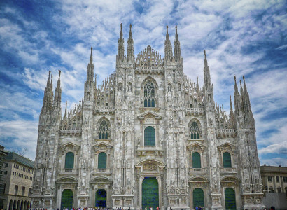 The iconic Milan Cathedral against a scenic cloudy sky, Italy