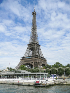 The iconic Eiffel Tower against a scenic cloudy sky, Paris, France